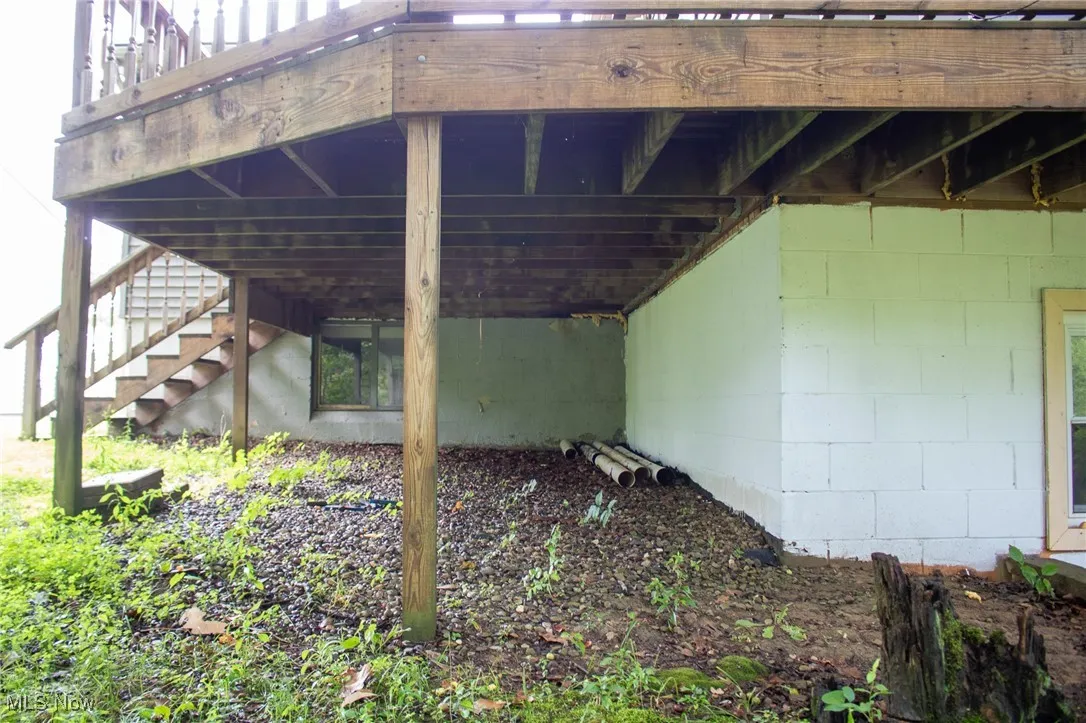 View of under deck with stairway