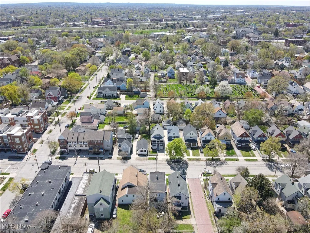 View of property location with nearby suburban area
