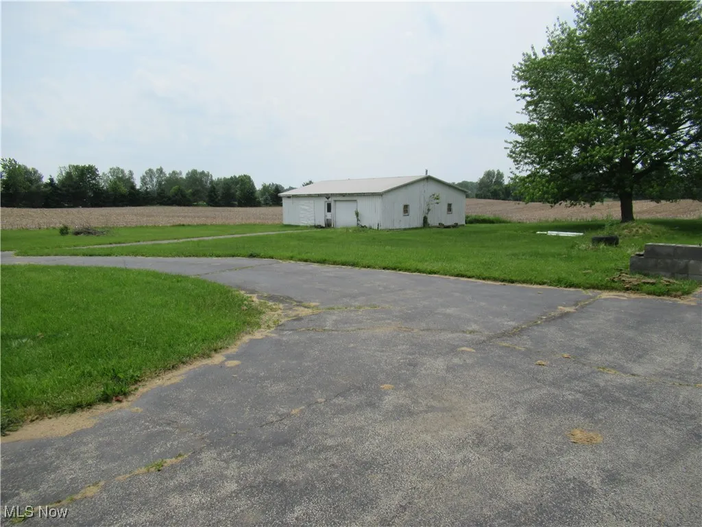 Circular Drive showing Large Garage