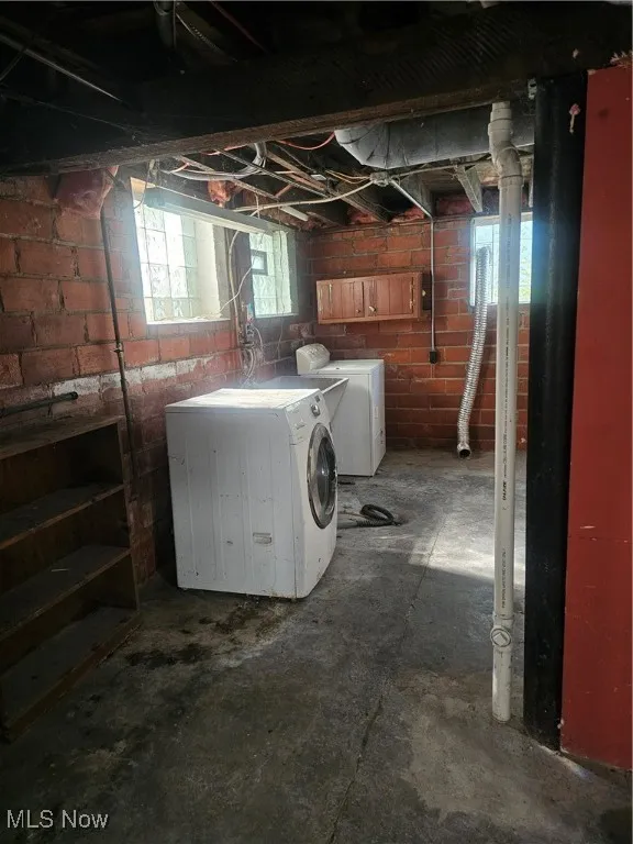 Basement featuring washing machine and dryer