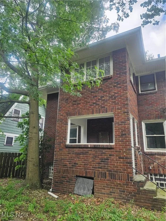 View of home's exterior with brick siding