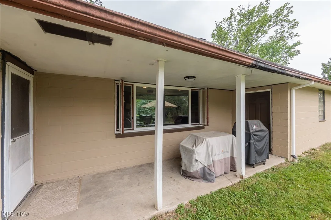 View of patio / terrace featuring a grill