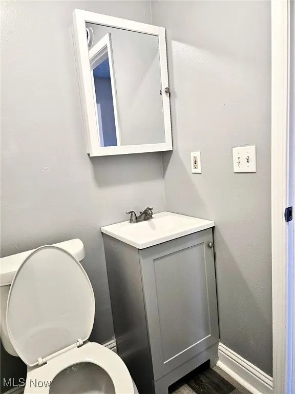 Bathroom featuring toilet and vanity