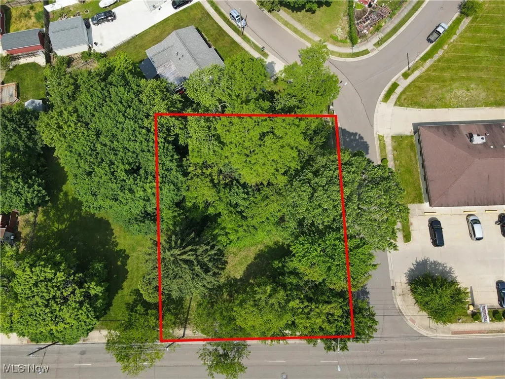 Aerial overview of property's location featuring property boundaries highlighted