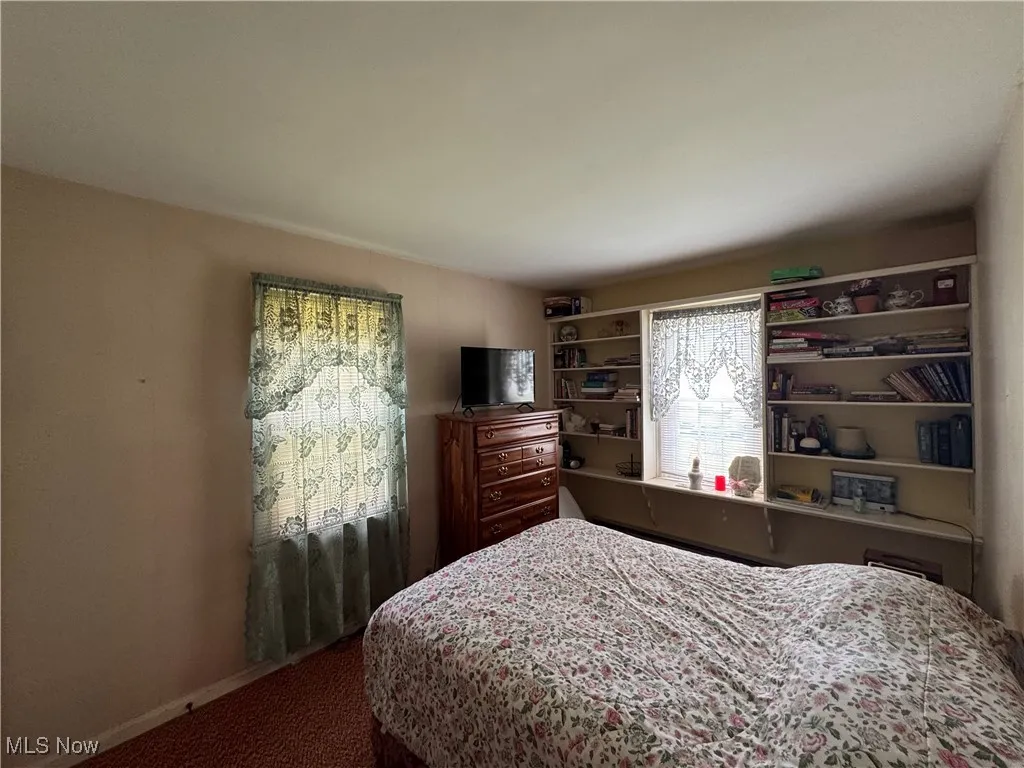 Bedroom featuring carpet floors