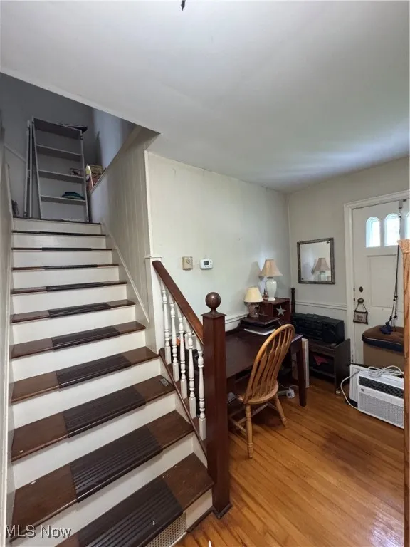 Staircase with wood finished floors