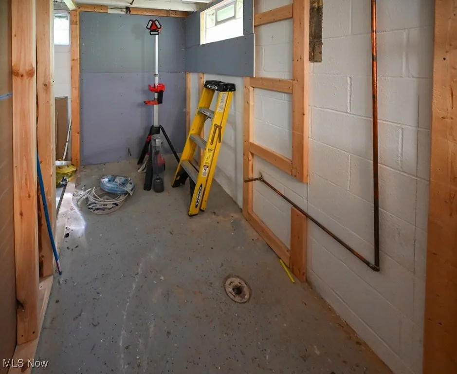 Below grade area with concrete block wall