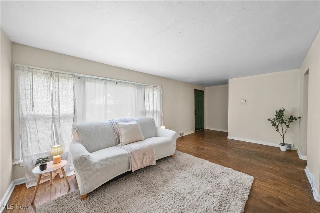 Living area featuring wood finished floors
