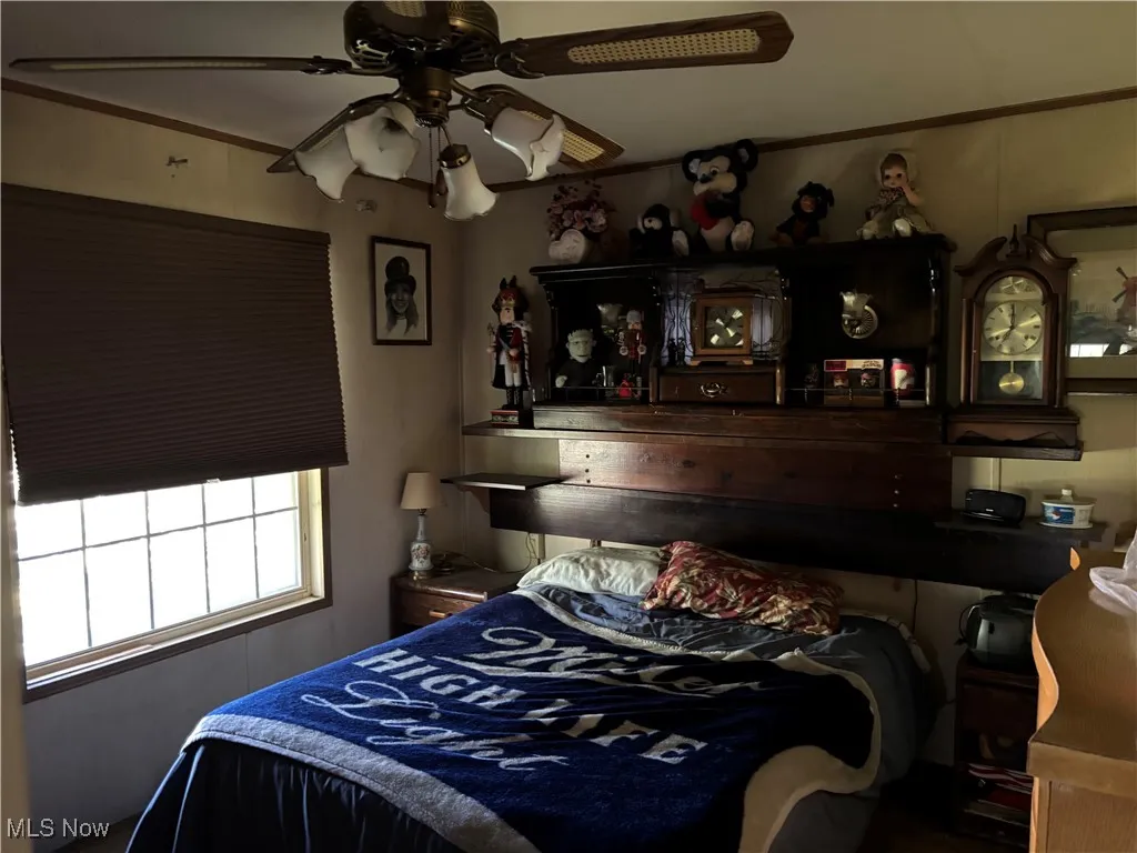 Bedroom featuring ceiling fan