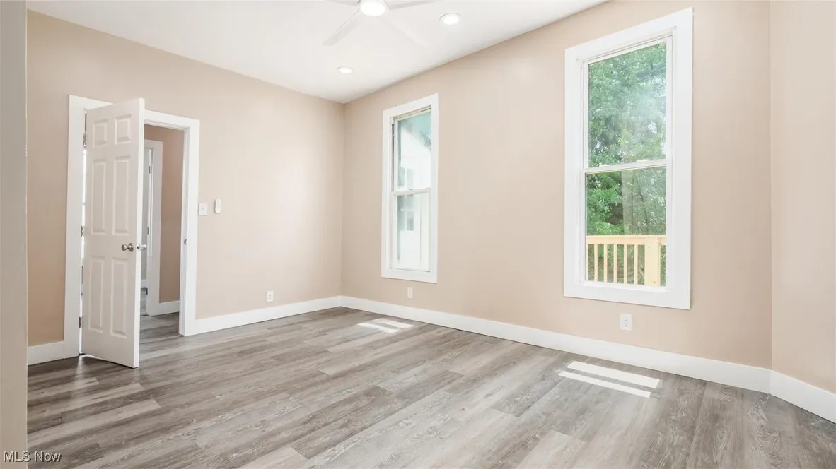 Spare room featuring a ceiling fan, wood finished floors, and recessed lighting