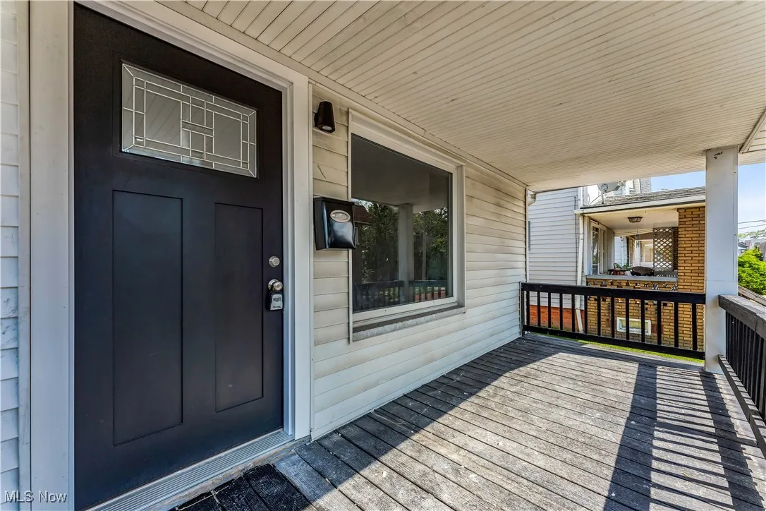 Entrance to property with covered porch