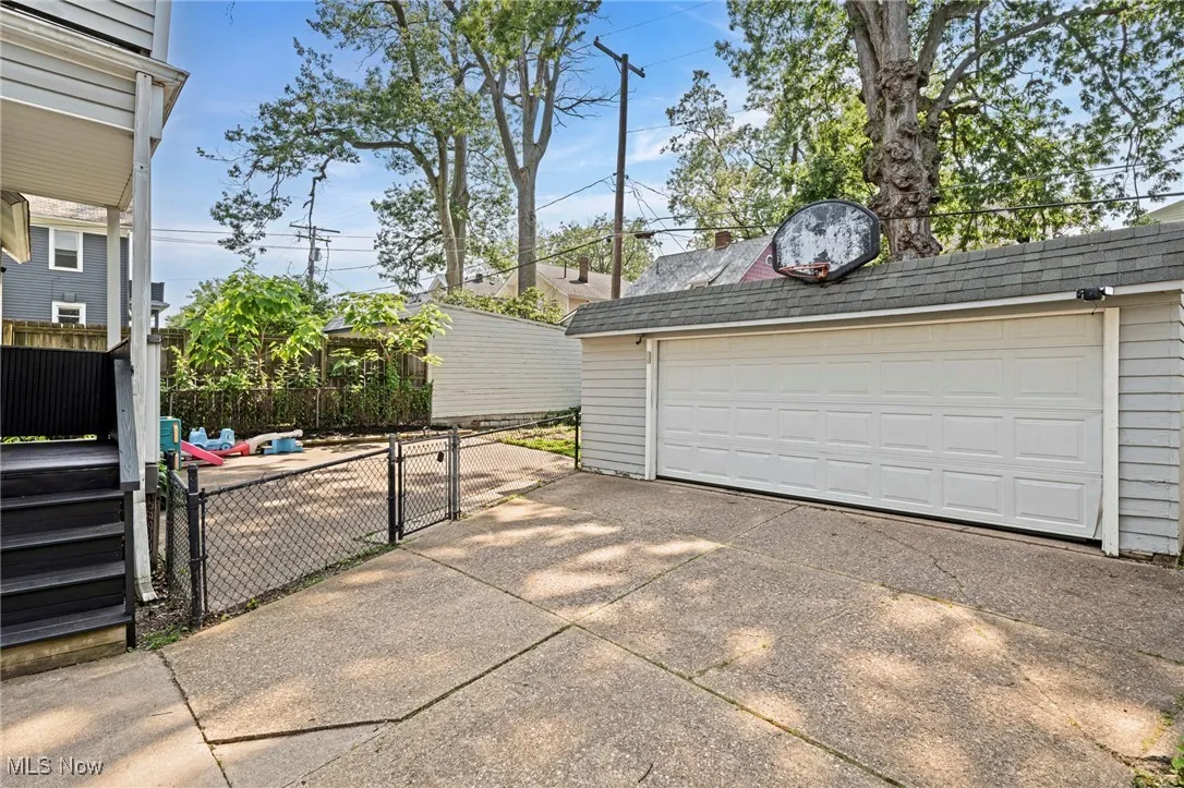 Detached garage with a gate