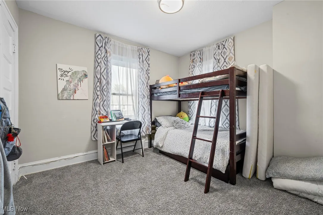 Bedroom with carpet flooring