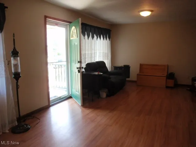 Entryway with wood finished floors