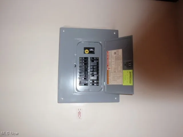 Utility room featuring electric panel