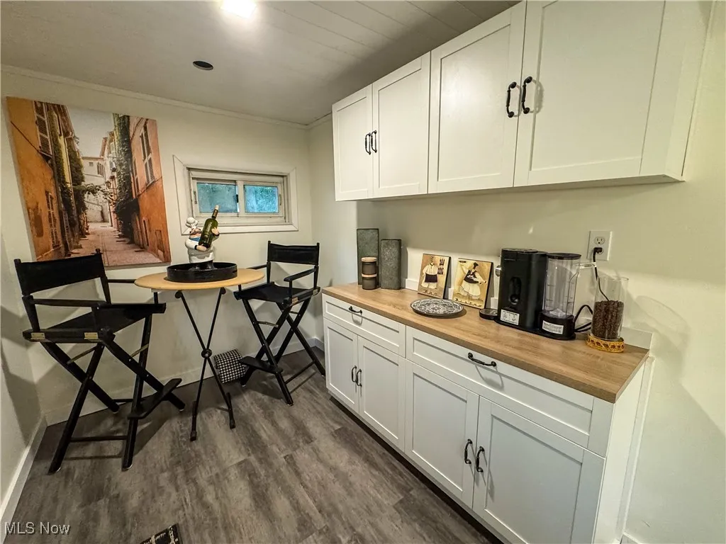 Another view of coffee bar and breakfast area.