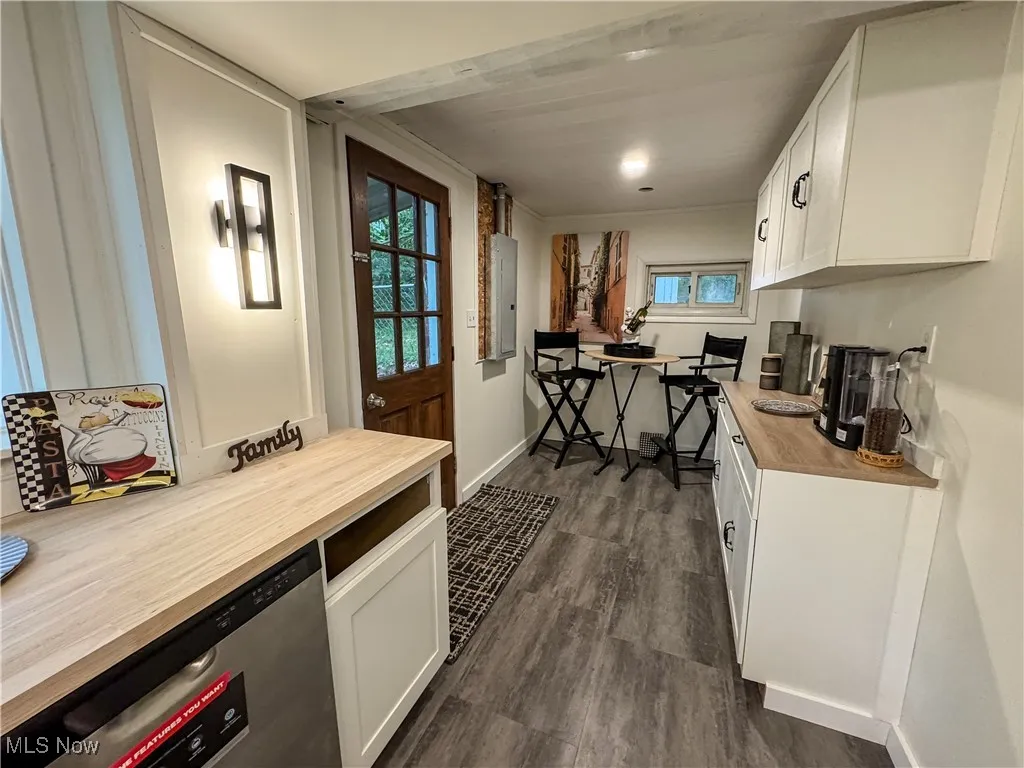 The coffee bar area provides additional cabinets with a breakfast area near by.