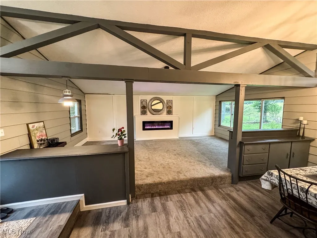 The update preserved the unique features of a 60's build, like angled ceilings, built- ins, different levels, and ship lap feature walls....
