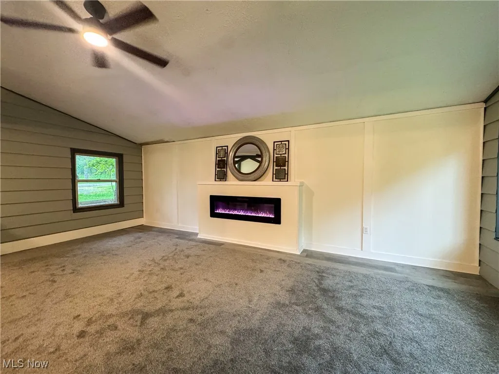 A view of the fireplace in the living room.