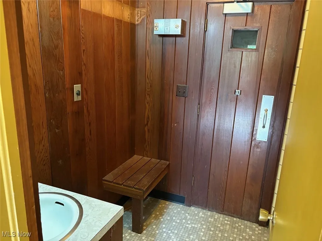 Bathroom featuring a stall shower and sauna