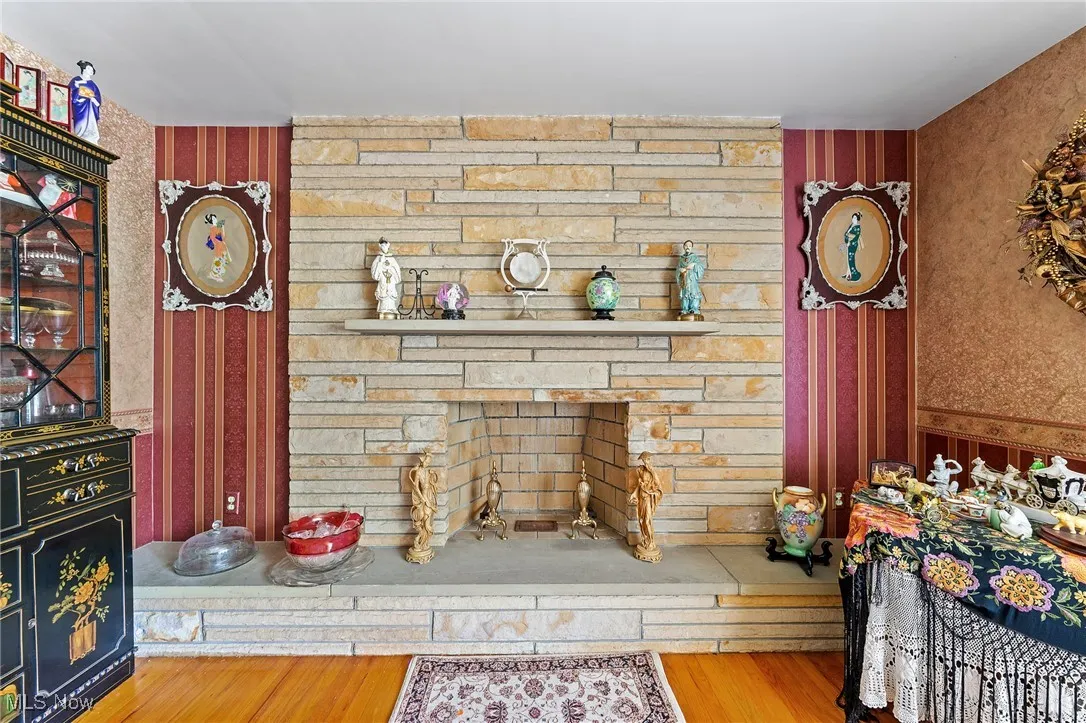 Woodburning Fireplace in Living Room.