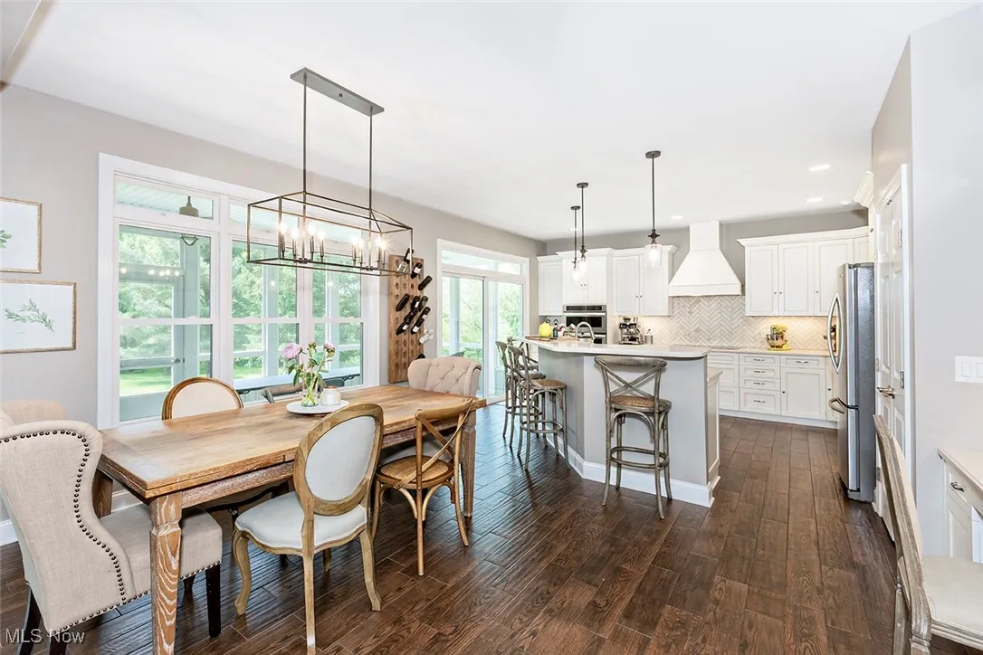 Open kitchen and dining area with the perfect blend of ambient and task lighting.