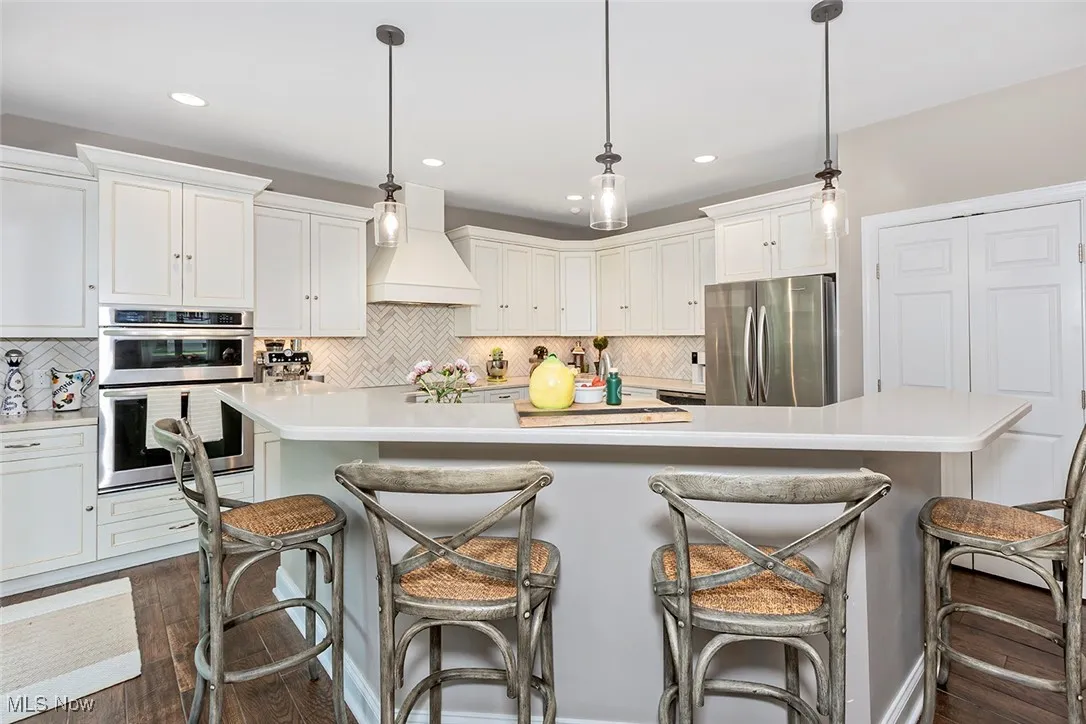 Large island with added seating, great for entertaining.