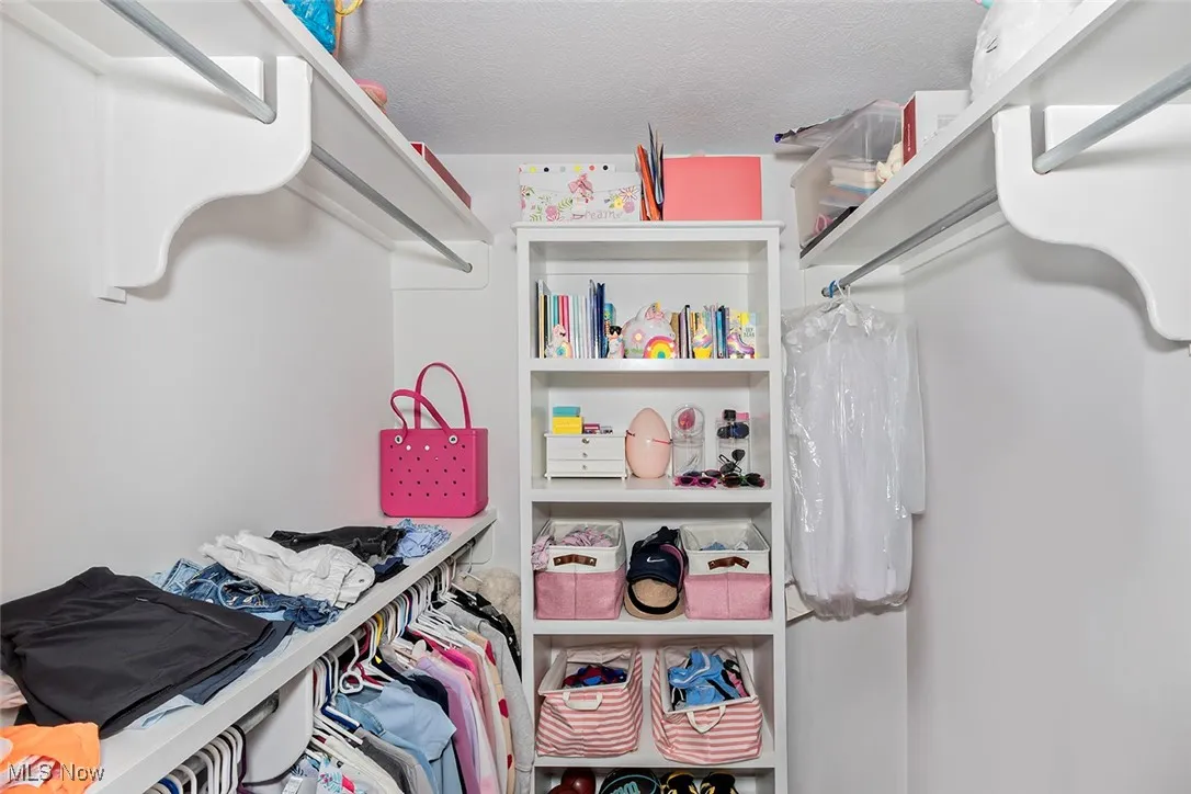 Customized walk-in closets in all bedrooms.