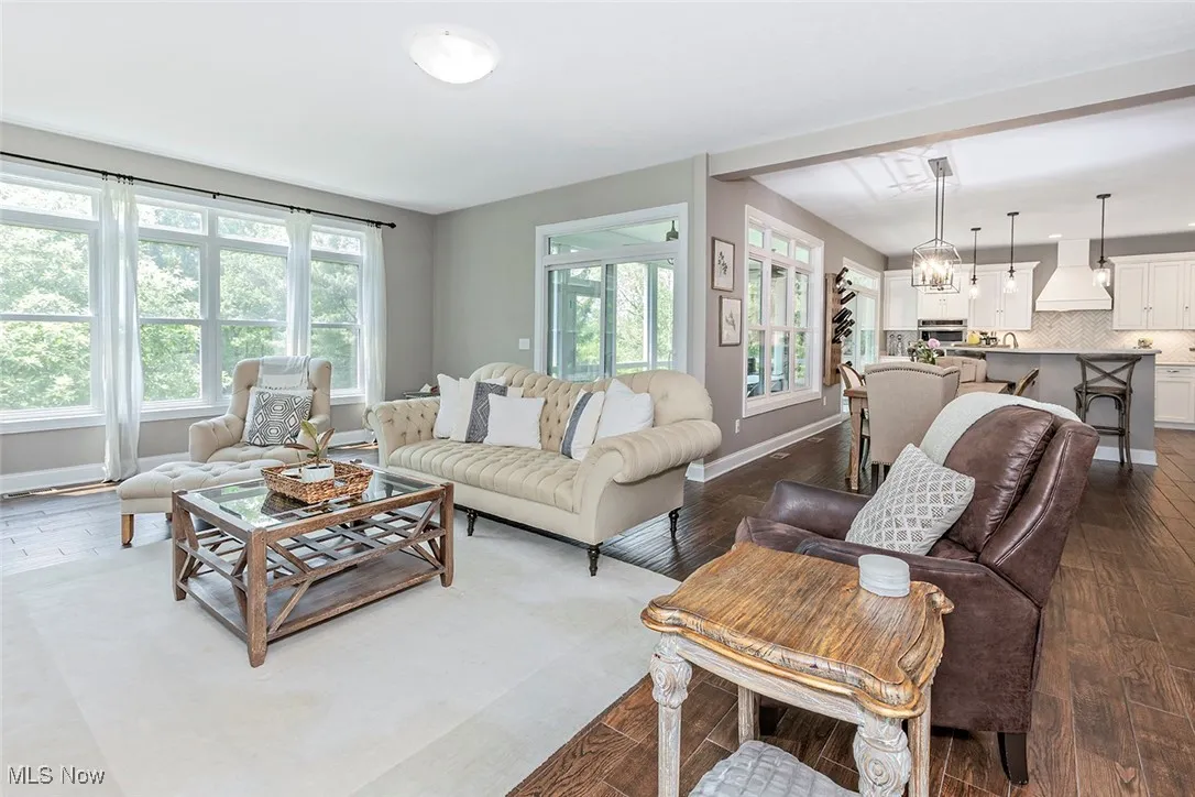 Open floor plan including living, dining and kitchen.