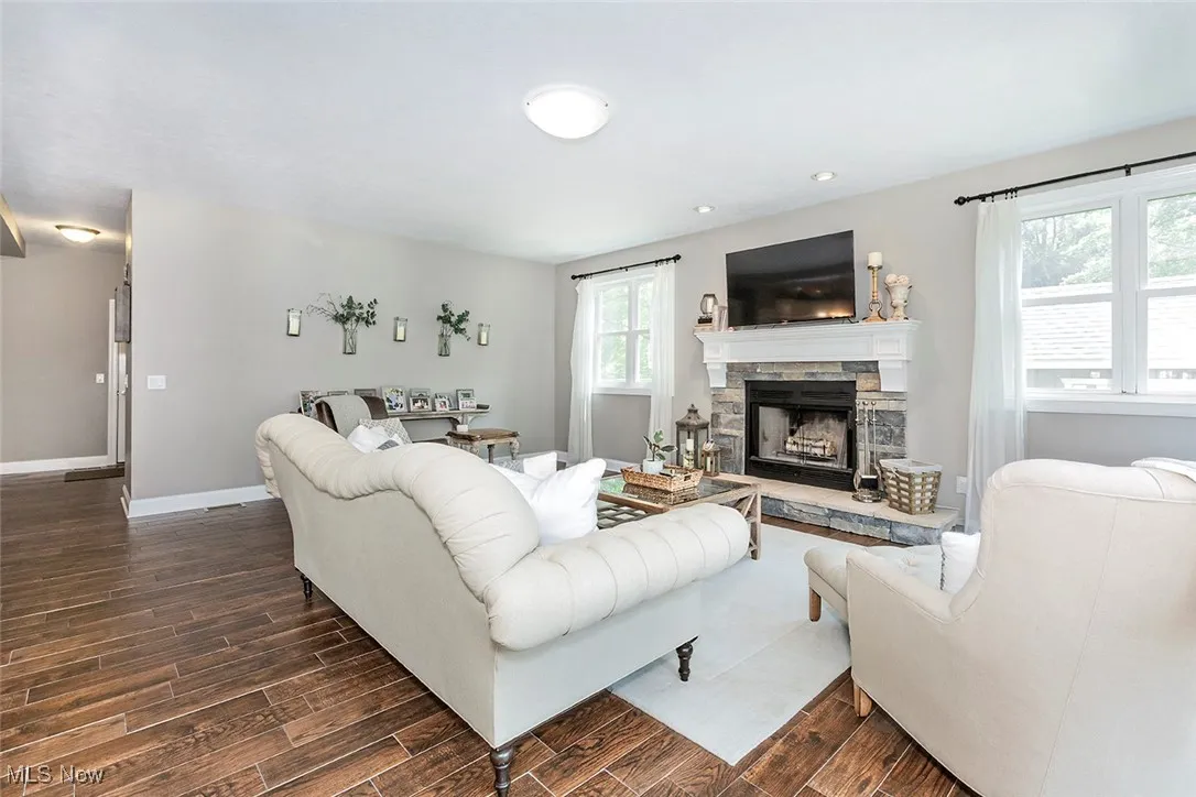 Hardwood style tile flooring.