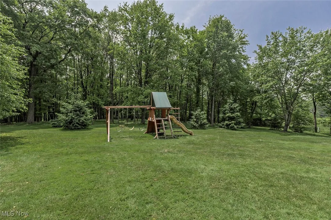 Low maintenance yard with playground.