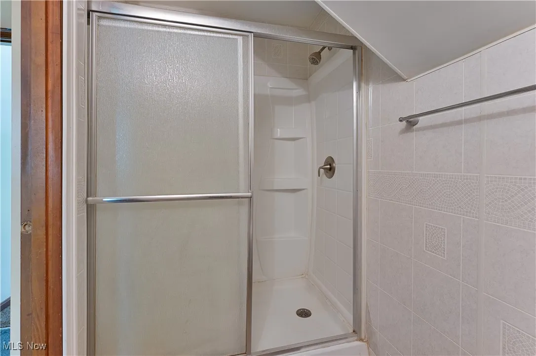 Bathroom with a stall shower