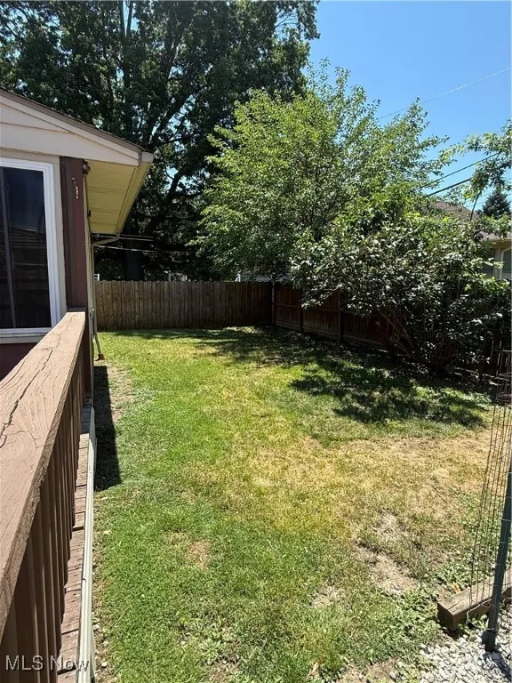 View of fenced backyard