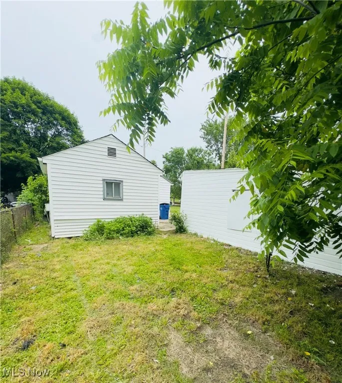 View of yard with an outbuilding