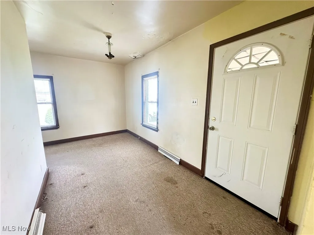 Living room featuring carpet