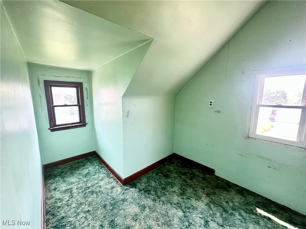 bonus room off 2nd floor bedroom with carpet