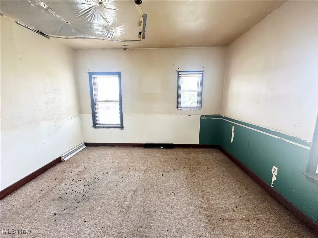 First Floor Bedroom featuring carpet