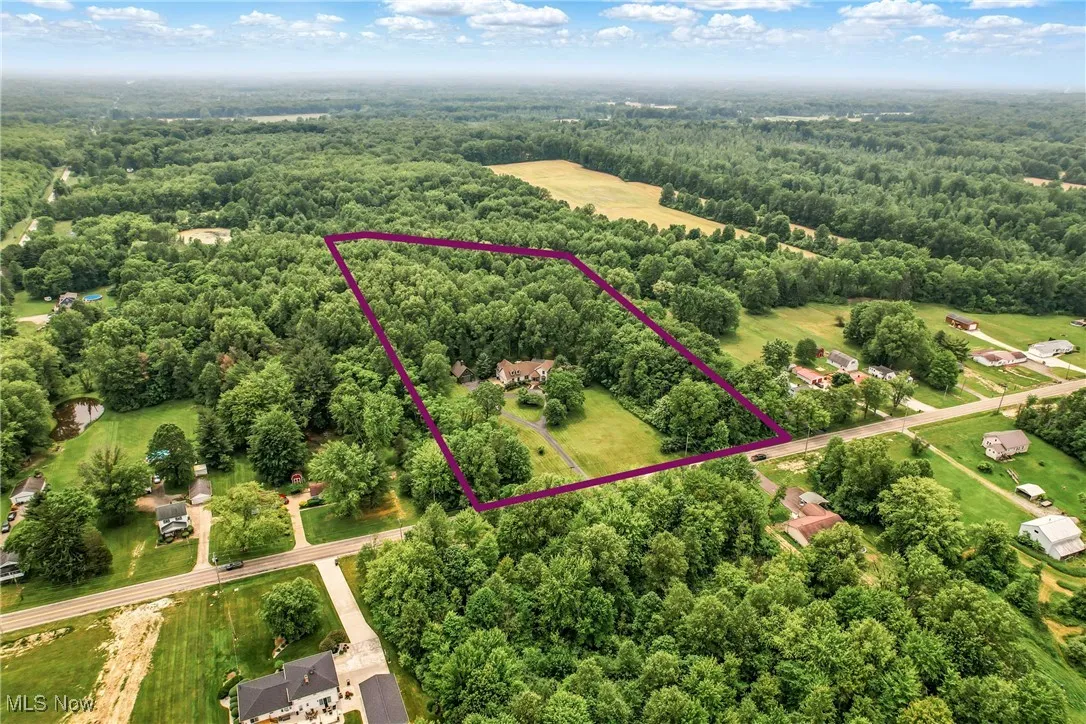 View of property location with a forest and property boundaries highlighted