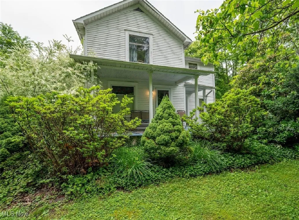 View of front of property featuring covered porch