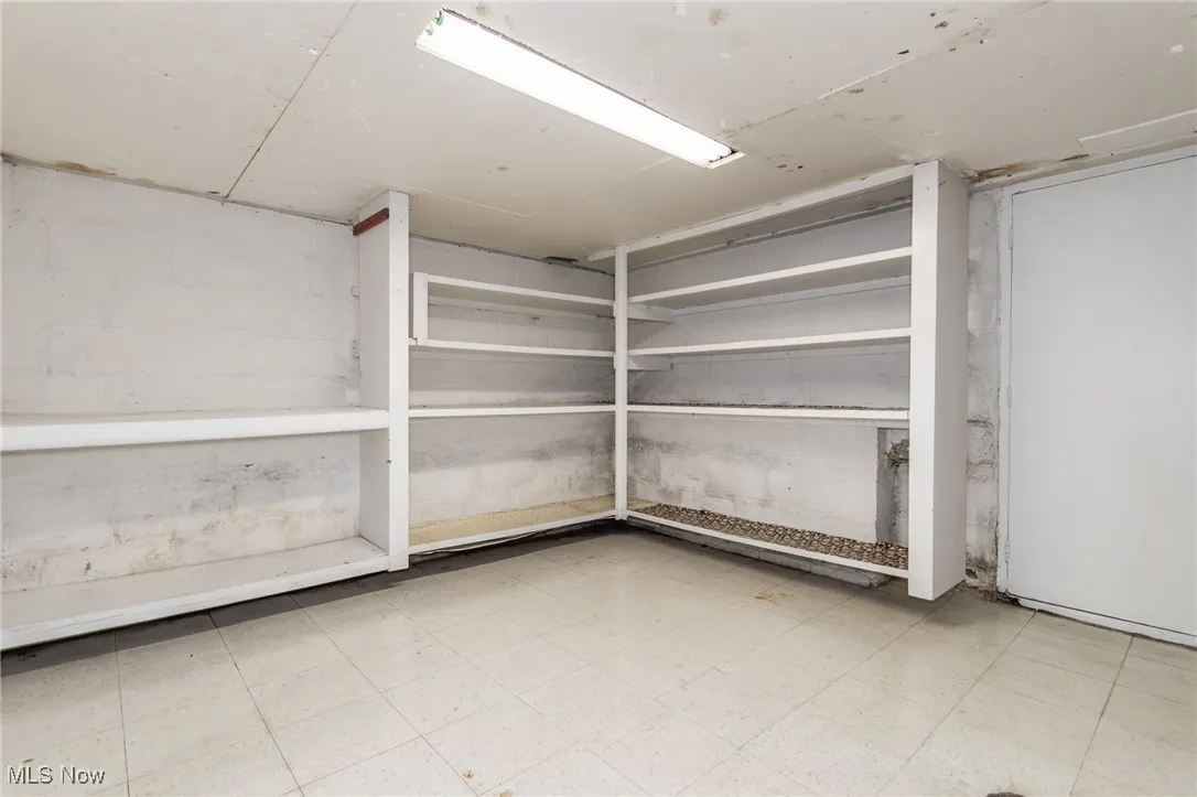 Basement featuring tile patterned floors