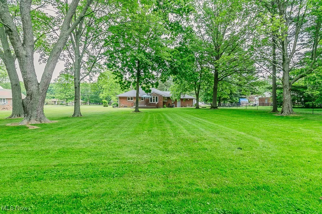 View of yard featuring a garage