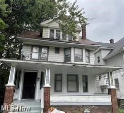 Traditional style home with a porch