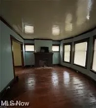 Unfurnished living room featuring a fireplace