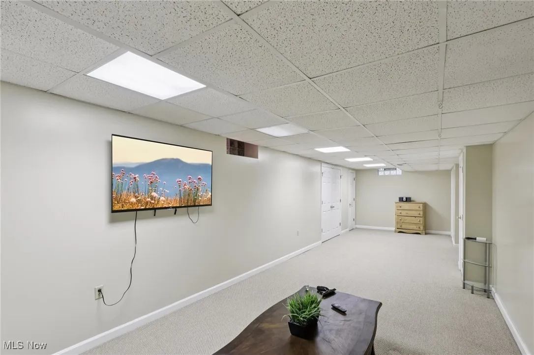 Finished basement with carpet floors