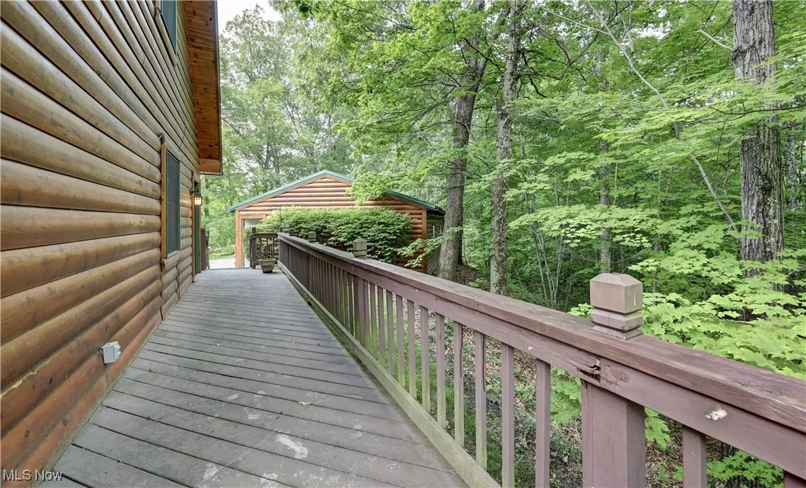 Deck with a wooded view