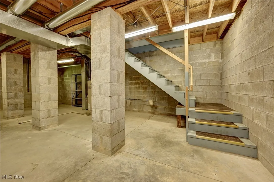 Unfinished below grade area with stairway