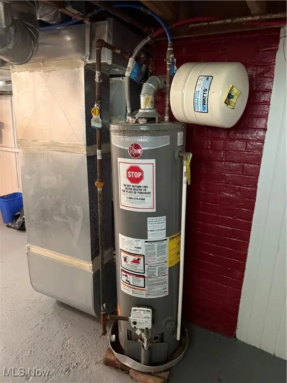 Utilities featuring gas water heater and heating unit