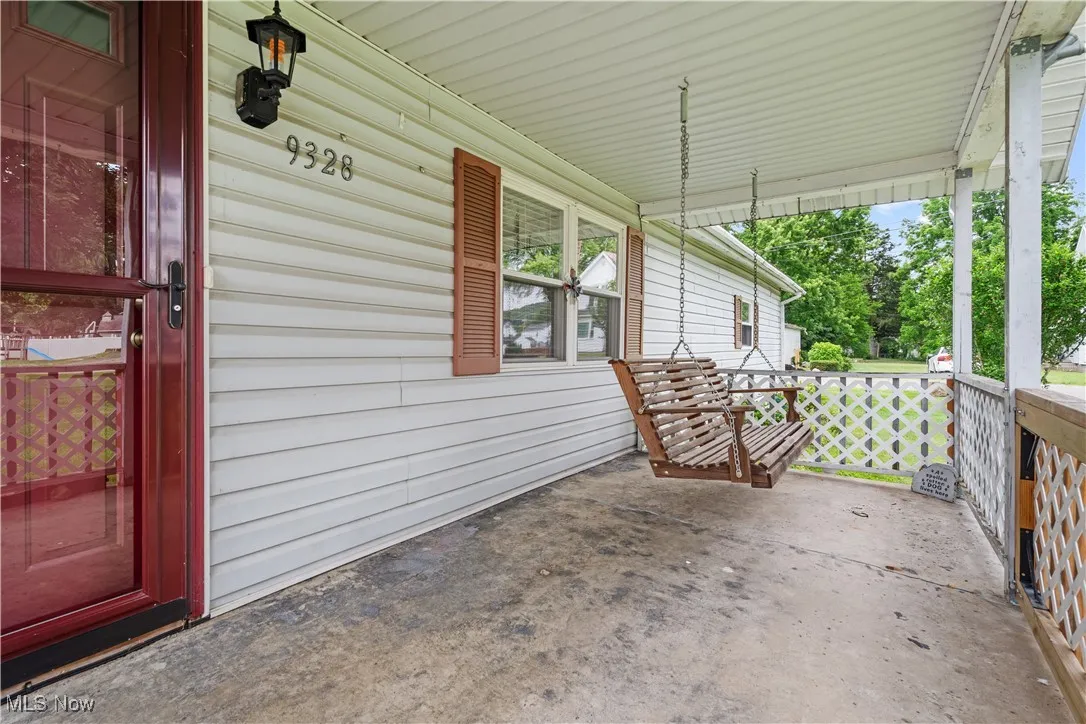 Front porch with swing.