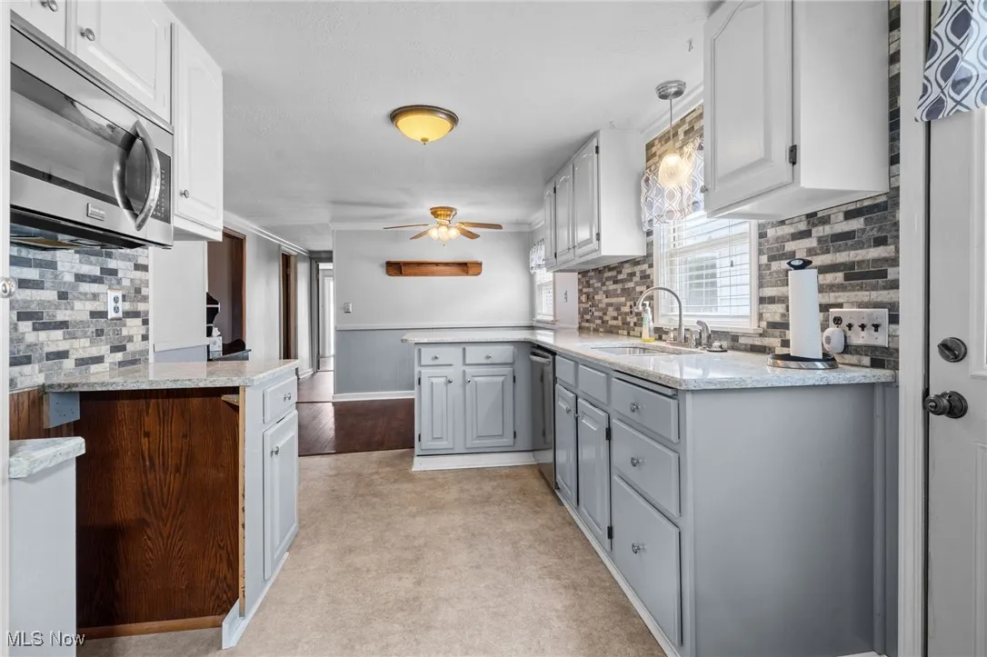 Updated kitchen with granite counters.
