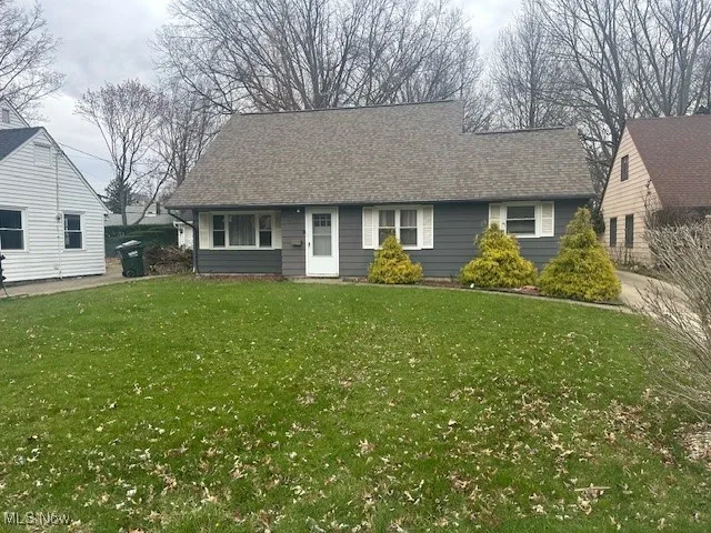 View of front of house with a front lawn
